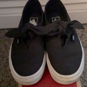 Black bow tie slip on vans